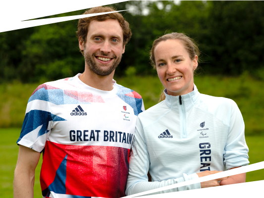 Dave Ellis and Claire Cashmore smiling together in their Paralympics GB team kit